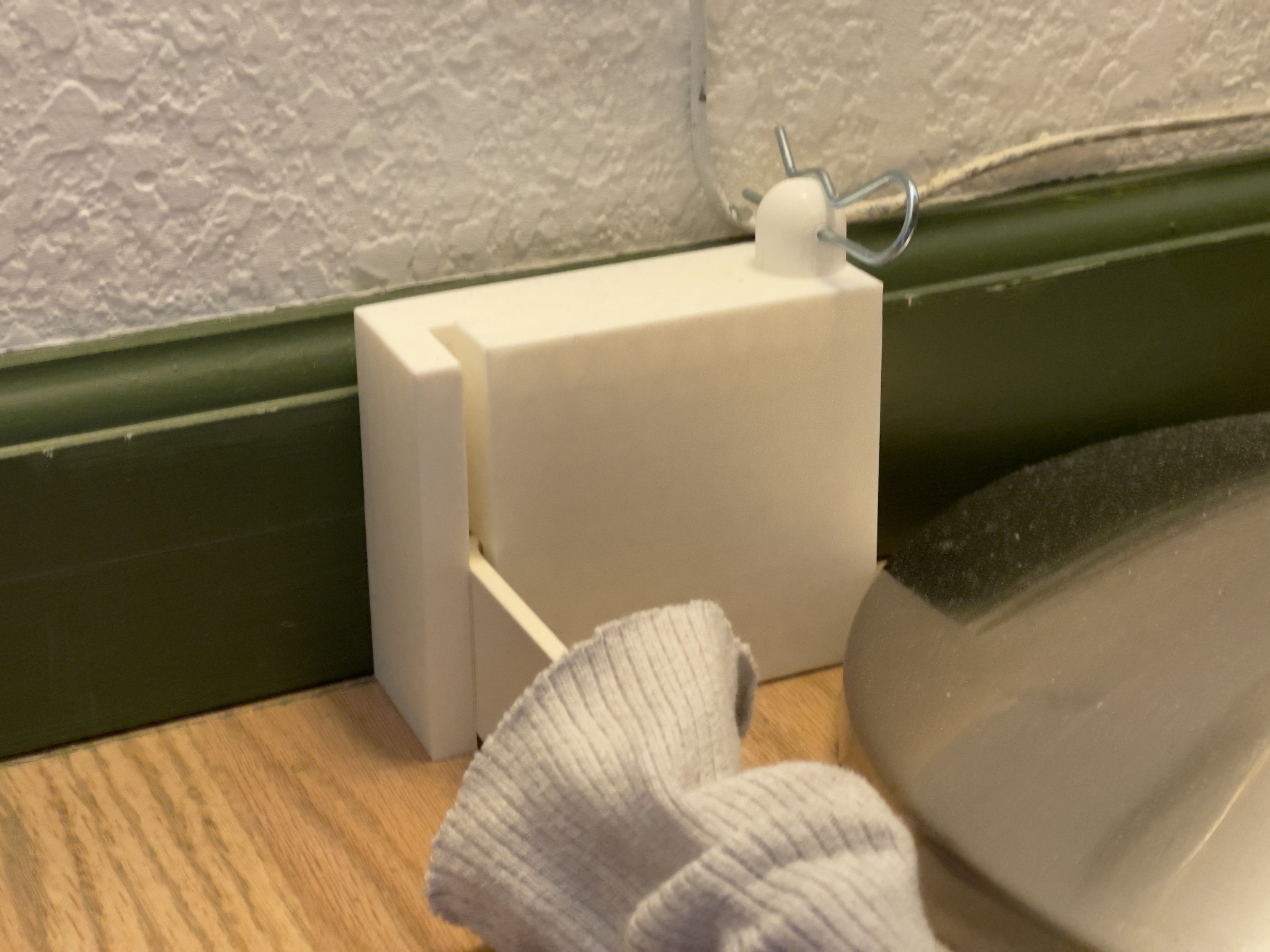Installed Bed Mount prototype holding a Murphy bed near the wall