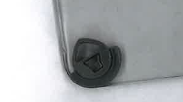 Reference photo of the original fridge dairy compartment mounting component
